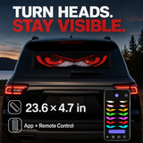 Programmable LED sign displaying red pixel eyes in a car rear window