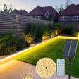echosari warm solar strip lights around a lawn with panel and remote