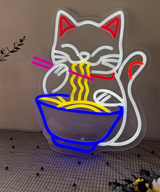 Cat eating noodles